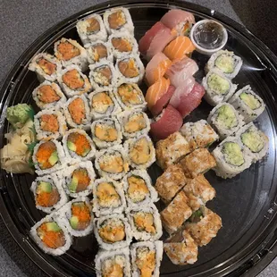 a plate of sushi on a table