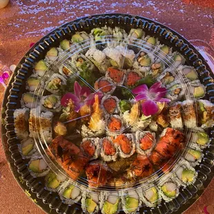 The letter J is in the middle in spicy tuna (sorry it's upside down in the pic)