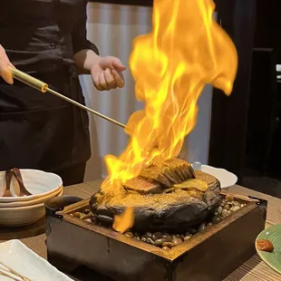A5 Wagyu on a hot rock with a flashy presentation. Super good. Maybe not worth the $125 though...