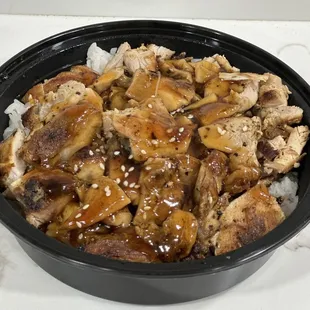 Chicken teriyaki bowl with white rice.