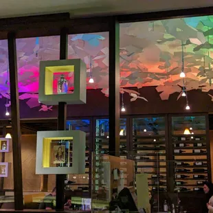 people sitting at a table in a restaurant