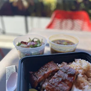 a meal in a plastic container on a table