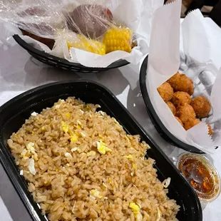 Cajun Fried Rice (no meat) Hush Puppies Corn on the Cob Potatoes