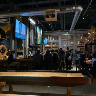 a crowd of people sitting at tables