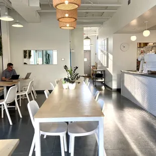 a table and chairs in a coffee shop