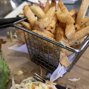 Seasoned fries, fresh slaw