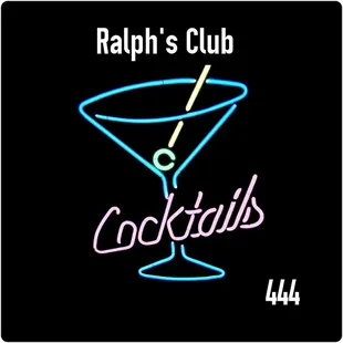 a neon sign of a martini glass