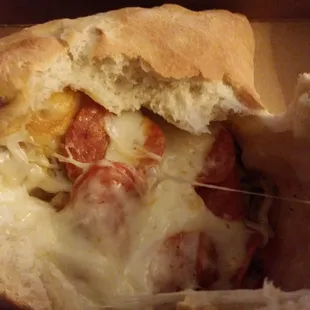 Mozzarella,  pepperoni,  and sausage.