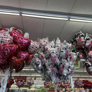 a variety of valentine's day balloons
