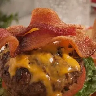 bacon and cheese on a burger