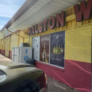 a car parked in front of a store