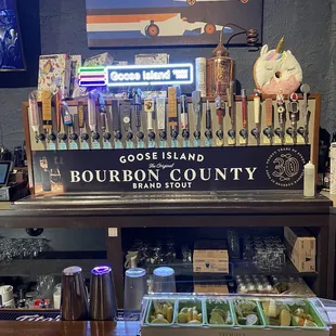 a bar with a variety of beers