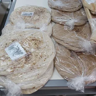 a variety of tortillas wrapped in plastic