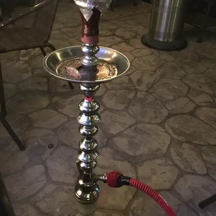 a glass of water and a hook