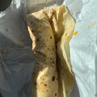 a burrito wrapped in paper