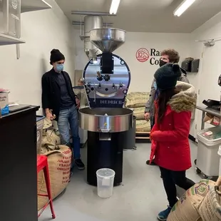 a group of people in a coffee shop