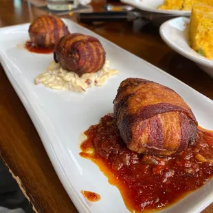 Big Daddy&apos;s Trio 
Meatloaf balls wrapped in bacon and stuff with smoke Gouda.