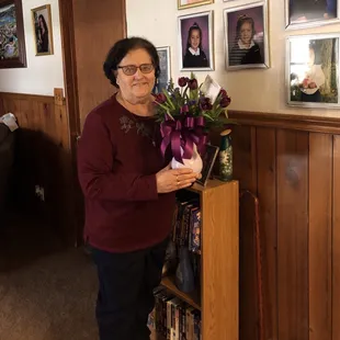 Mom holding flowers from Ramblin Roses