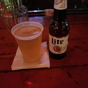  beer and a beverage on a table