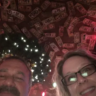 Note the signed $1 bills covering the ceiling!