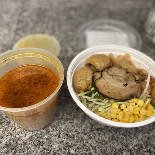 a bowl of soup and a cup of soup