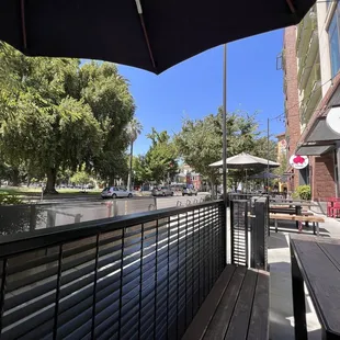Outdoor patio with a view of the park.