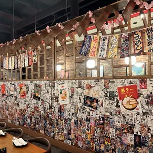 Restaurant divider covered in anime