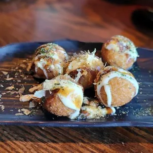 a plate of food on a wooden table