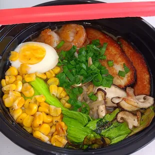a close up of a bowl of ramen