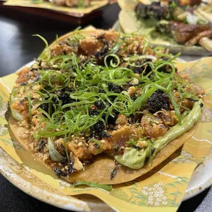 Spicy tuna tostada $13