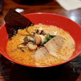 Garlic Pork Ramen - tonkotsu broth, topped with roasted pork, ground chicken, fried garlic, spinach, quail egg, kikurage mushroom, seaweed