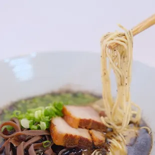 a close up of a bowl of ramen ebisu
