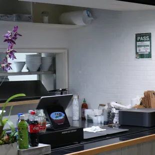 a kitchen counter with a coffee machine