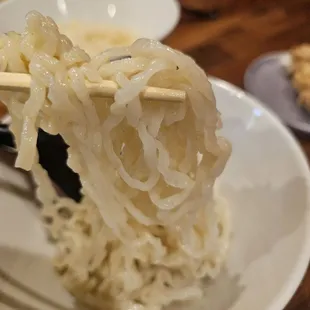 Close up of thick wavy noodles