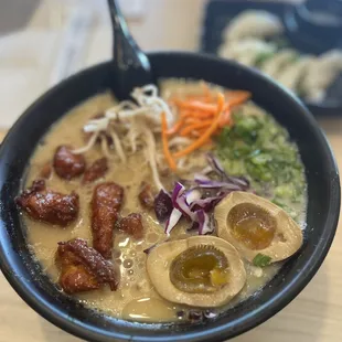 Build Your Own Bowl Seasoned Soft Boiled Egg Broth Broth, sprouts, cabbage, green onions, carrots and teriyaki chicken