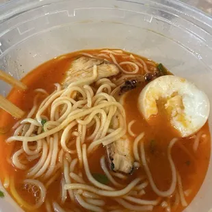 Slimy noodles with boiled egg.
