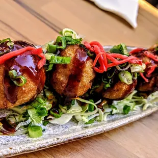 Takoyaki (octopus in fried pancake)