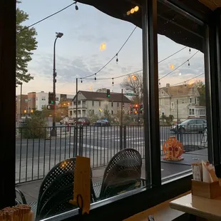 a view of a street through a window