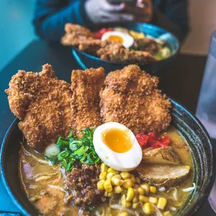 a bowl of ramen with a boiled egg