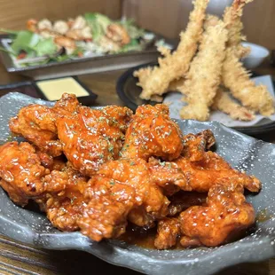 a plate of fried chicken wings
