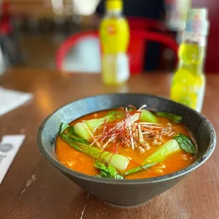 a bowl of soup on a table