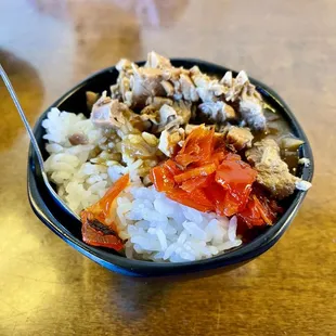 a bowl of ramen and rice