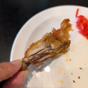 Spicy wings, but they cut a full flat wing in half.