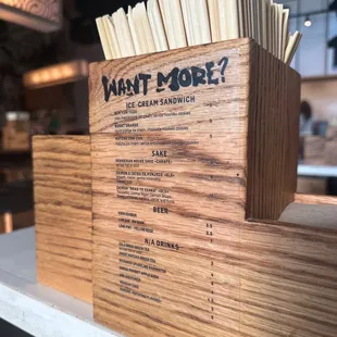 Menu on the accessory holder (chopsticks, soup spoons, napkins, etc.)