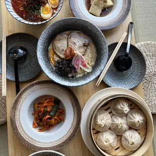 Tonkatsu ramen, pork soup dumplings, cucumber kimchi