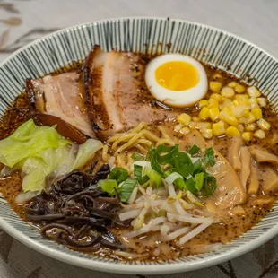 a bowl of ramen with an egg