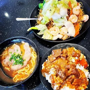 three plates of food on a table
