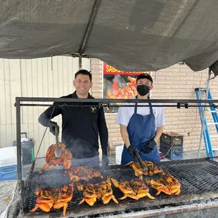Delicious Grill chickens cooked on mesquite charcoal