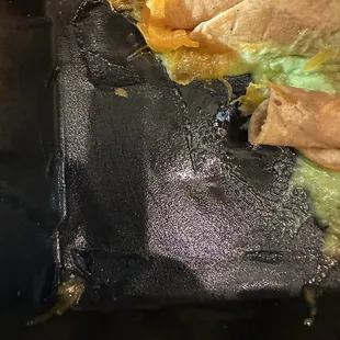 Melted styrofoam in 3 Rolled Tacos Cheese &amp; Guacamole