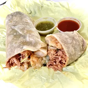 Shredded chicken burrito w/ beans, cheese, rice, onion &amp; cilantro. Salsas on side.
